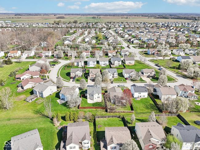 aerial view of property's location with nearby suburban area | Image 86