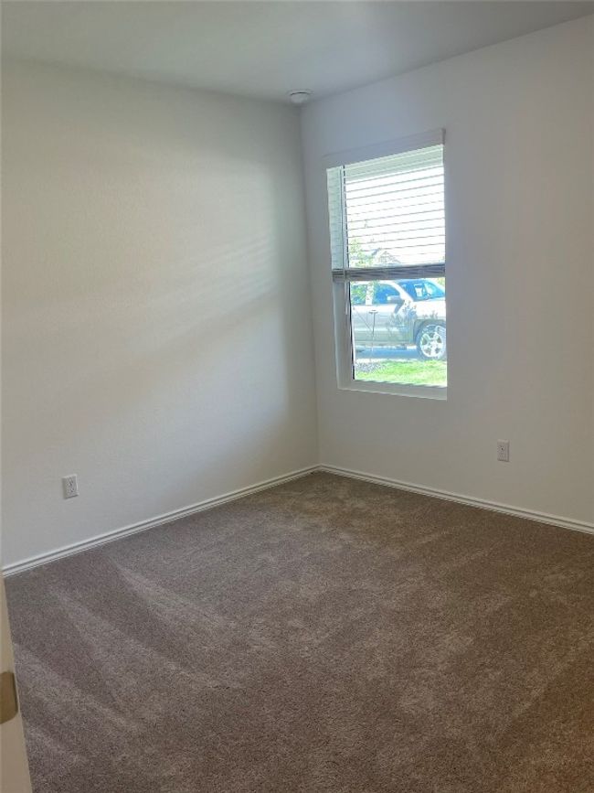 Secondary bedroom with carpet floor | Image 12
