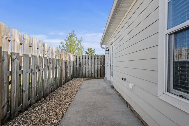 Fence back patio with storage closet | Image 15