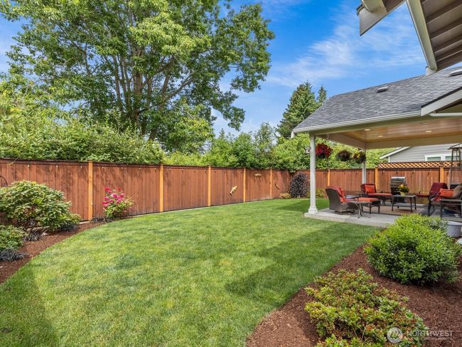 With one of the largest yards in the neighborhood, your gardens will love all of the sunshine. | Image 19