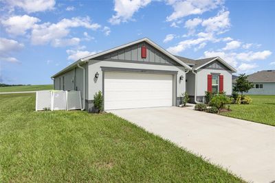 2437 Begonia Street, House other with 4 bedrooms, 2 bathrooms and null parking in Mascotte FL | Image 2