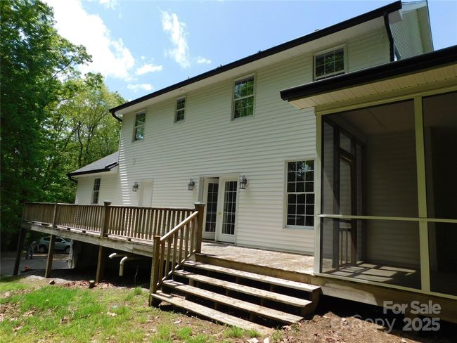 Enjoy the warmth of the sun from the back deck. | Image 5