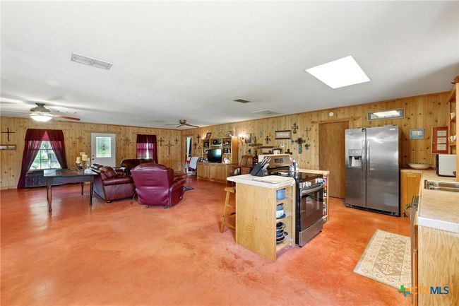 Kitchen view into living main house | Image 10
