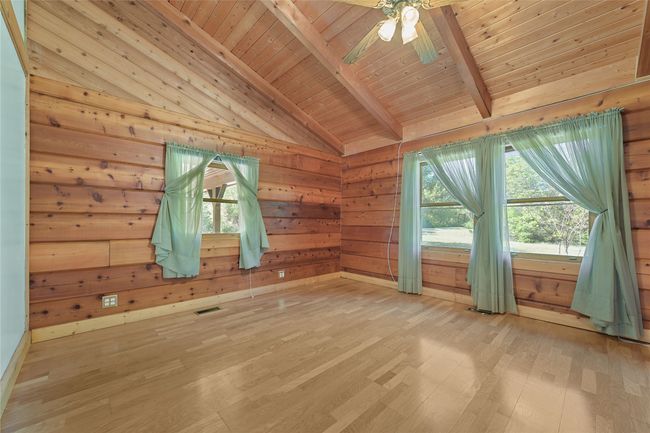Red Cedar, Engineered Flooring. Single window view to carport, double window to Front yard, and 600'driveway. | Image 13