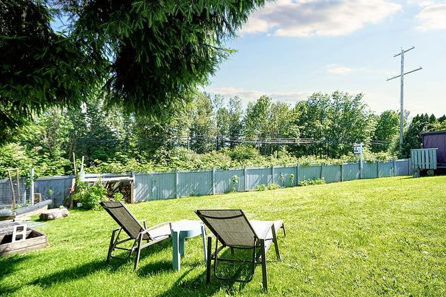 View of yard featuring a garden | Image 15