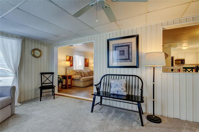 33. BONUS Room (9.9' x 15.5) Opens Into Living Room, Carpeted Room, Window AC for Xtra Cooling!. | Image 32