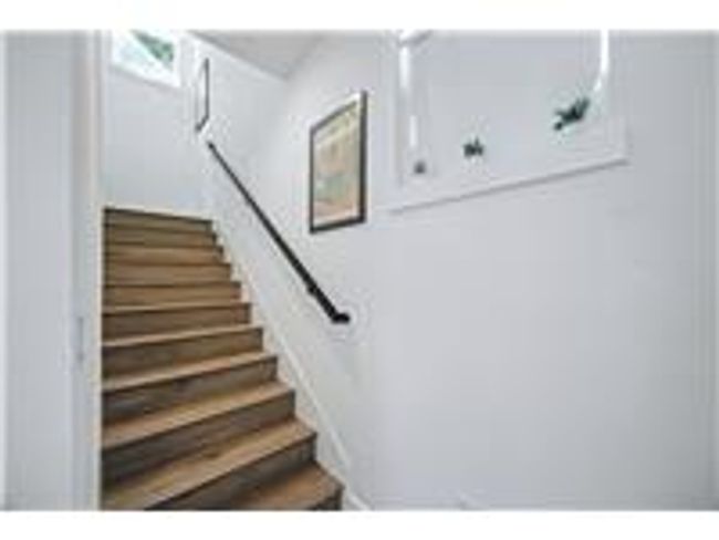 Stairway with wood finished floors | Image 28