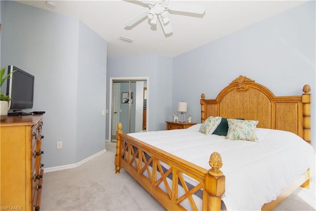 Primary Bedroom Suite offers 2 walk in closets. | Image 13