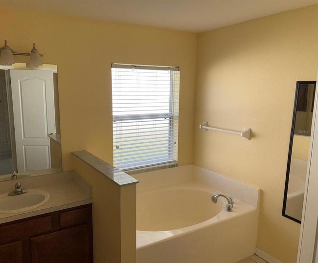697 Winding Lake Dr, House other with 4 bedrooms, 3 bathrooms and null parking in Clermont FL | Image 8