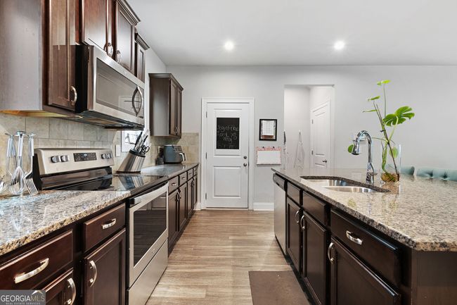 3255 Morgan Rd, House other with 5 bedrooms, 4 bathrooms and 2 parking in Buford GA | Image 17