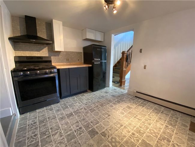 Recently renovated kitchen with space for a table | Image 10
