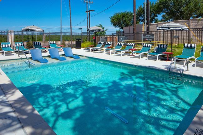 Community pool featuring fence and a patio | Image 18