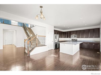 Kitchen w/ample Cabinets, Large Island, Granite Counters & Pantry | Image 1