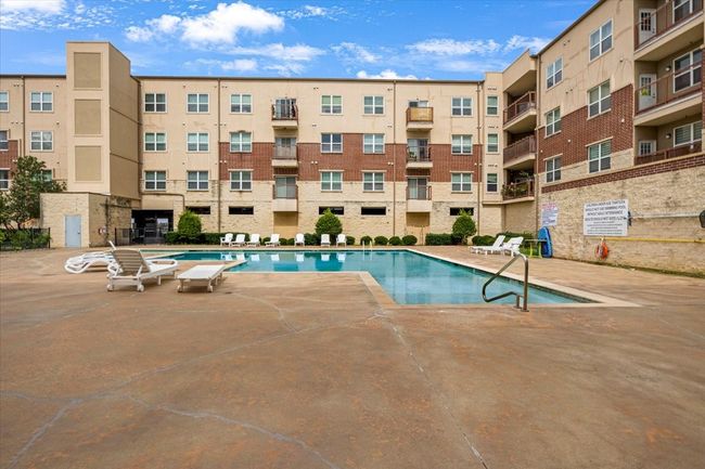 Community pool featuring a patio area | Image 4