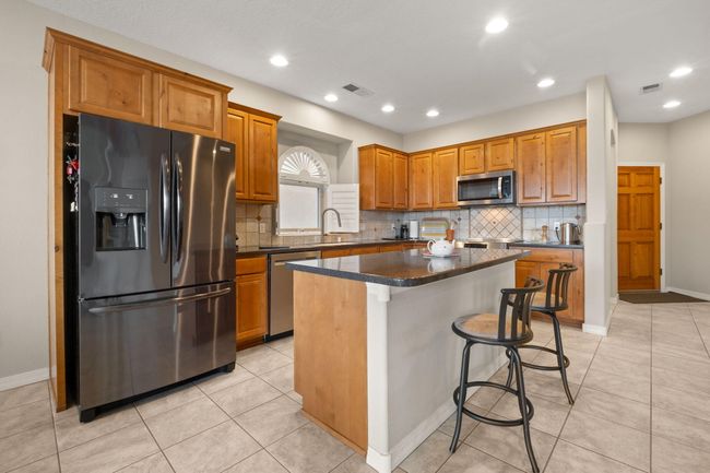 8719 Desert Fox Way, Condo with 3 bedrooms, 3 bathrooms and null parking in Albuquerque NM | Image 6