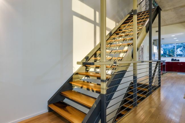 Staircase with hardwood / wood-style floors | Image 10