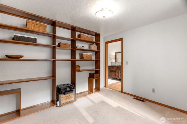 Built in storage/display in the main floor office | Image 14