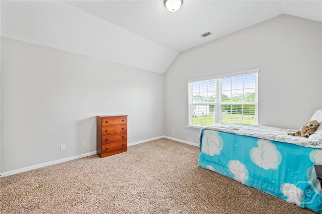 Third bedroom with vaulted ceiling. | Image 28