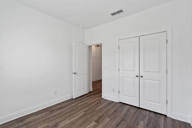 Extra large closet with LVP flooring in the secondary bedroom! | Image 6