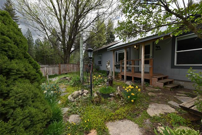 View of yard featuring fence | Image 54