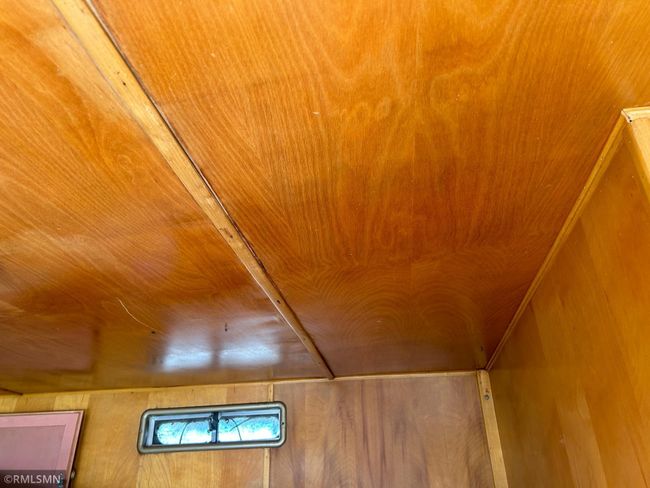IMG_9392.jpeg ceiling in bedroom of yellow mobile home | Image 26