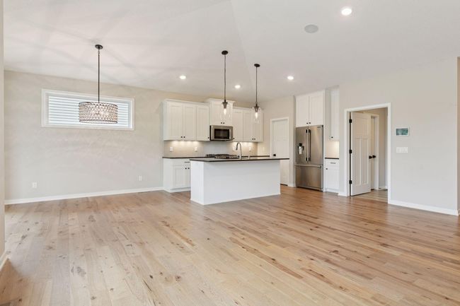 Fabulous and modern main level offers an open floor plan for the comforts of everyday living and ease of entertaining | Image 11