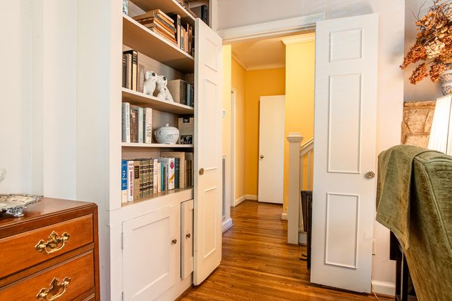 Living Room Doorway towards Main Floor Bedroom | Image 32