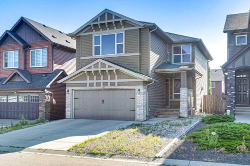 92 Cougar Ridge Close Sw, House with 3 bedrooms, 3 bathrooms and 4 parking in Calgary AB | Card Image