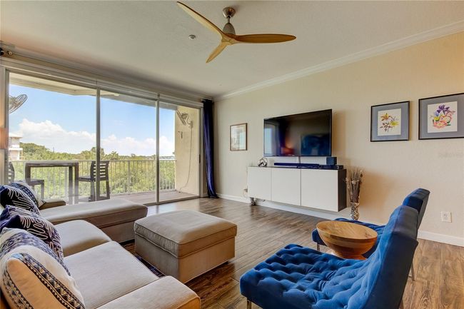 Living Room space with Large Waterfront View Balcony | Image 10