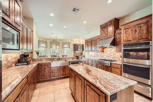 Custom Alderwood Cabinetry w/ dove tail construction | Image 4