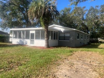 405 S June Drive, House other with 4 bedrooms, 2 bathrooms and null parking in Leesburg FL | Image 1