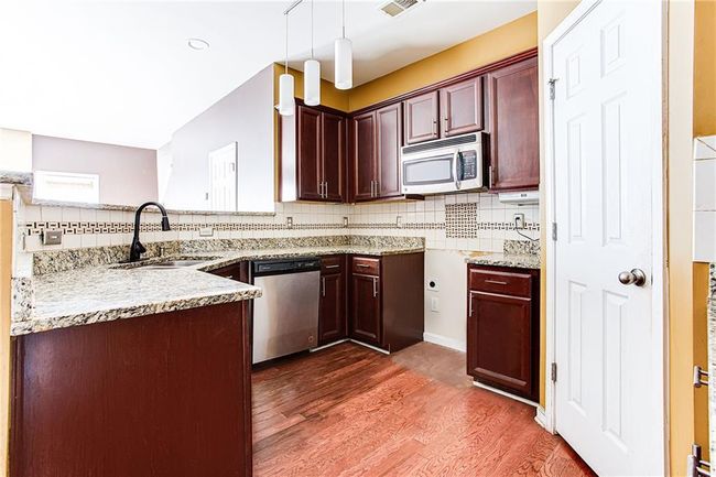 3392 Sable Elm Ct, Townhouse with 3 bedrooms, 3 bathrooms and null parking in South Fulton GA | Image 4