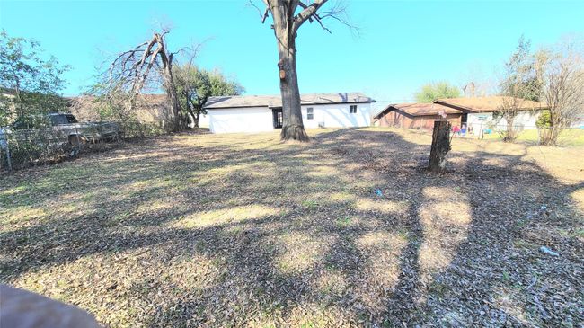 View of backyard facing house | Image 11