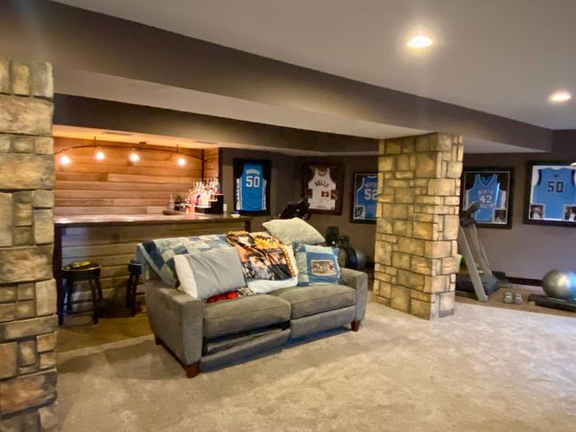 Basement family room, walks out to garage | Image 28