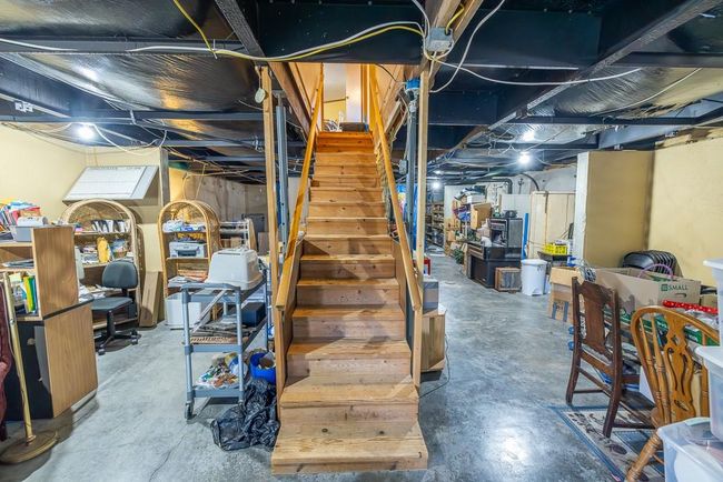 Unfinished basement featuring stairway | Image 25