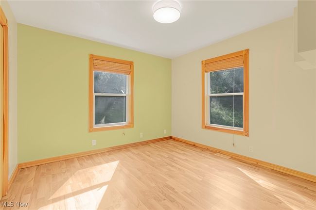 Unfurnished room featuring light wood-type flooring | Image 25