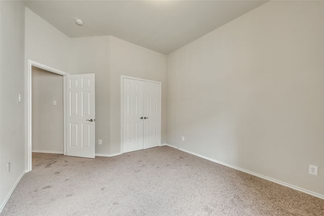 Unfurnished bedroom featuring carpet floors and a closet | Image 28