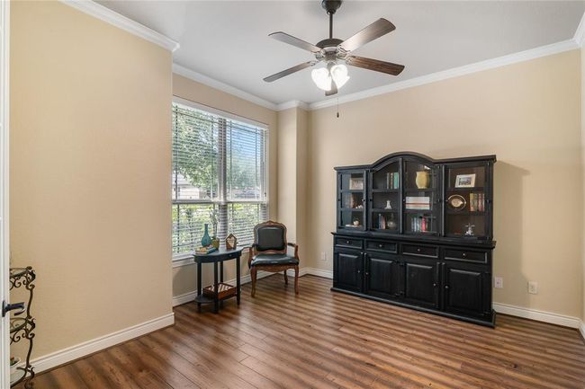 The extrasized office/study has enticing natural light. | Image 6