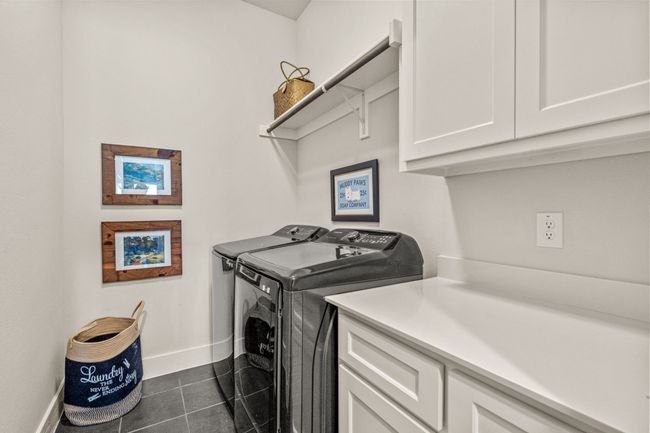 Generous utility room with built-in cabinetry | Image 26