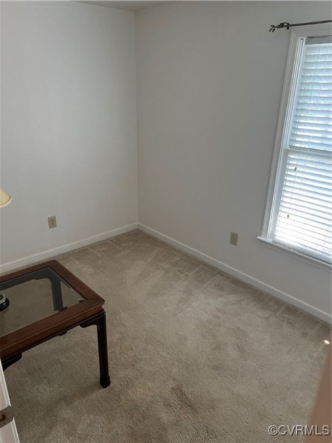 Carpeted empty room featuring baseboards | Image 10