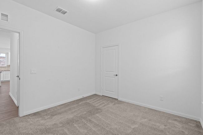 Carpeted spare room featuring baseboards | Image 19