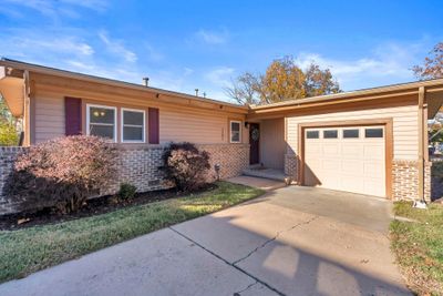 Ranch-style house with a garage | Image 2