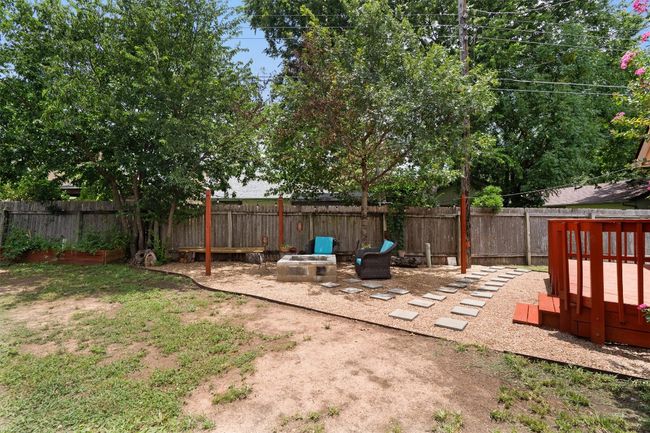 View of fenced backyard | Image 33