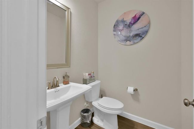 The downstairs powder bathroom. | Image 29