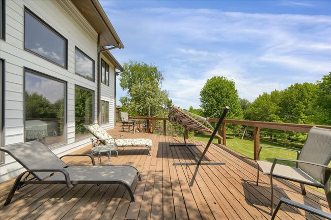 Large Deck Overlooks Fenced Back Yard | Image 25