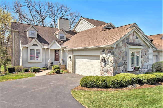 4592 Glen Eagles Dr, Condo with 4 bedrooms, 4 bathrooms and null parking in Brighton MI | Image 39