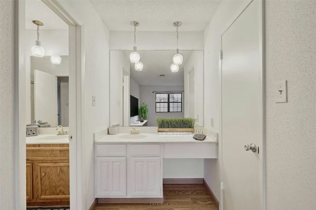 Primary suite also has it's own vanity and sink. | Image 14