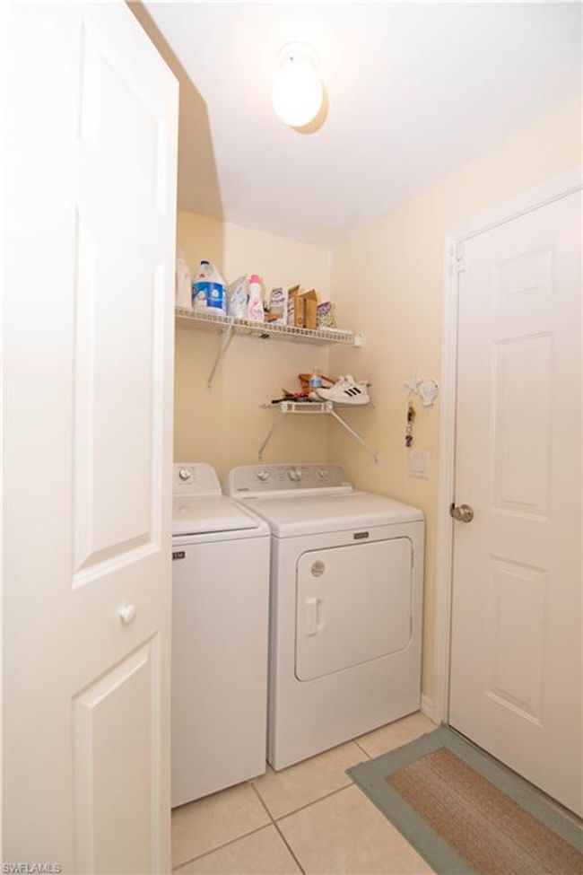 In unit laundry closet also offers additional space for storage. | Image 24