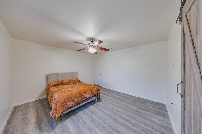 The ceiling fan in bedroom #2 provides comfortable airflow and helps keep the room cool. | Image 27