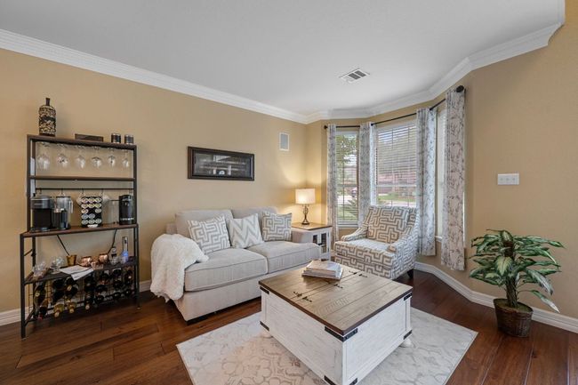 A formal living area at the front of the home is a perfect quiet spot to unwind | Image 9
